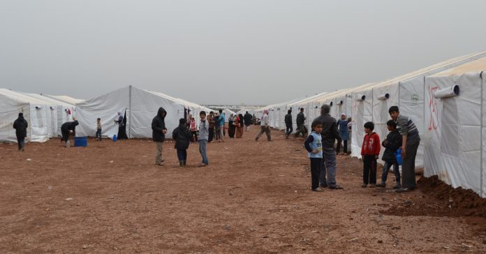 La crisis de refugiados es una problemática que afecta a todo el planeta. En la foto, un campo de refugiados en Alepo (Siria), en 2014. (IHH Humanitarian Relief Foundation / Flickr)