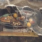 El fresco encontrado en Pompeya muestra un plato que recuerda a la pizza moderna (Parco archeologico di Pompei)